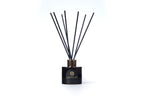 Caledonian Yule Reed Diffuser, handmade in Scotland by Wilderness Brae on white background
