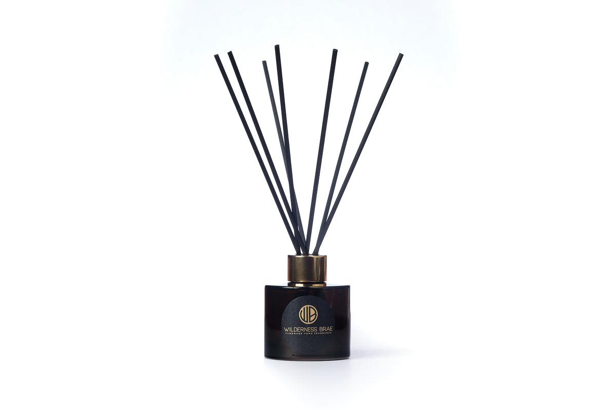 Caledonian Yule Reed Diffuser, handmade in Scotland by Wilderness Brae on white background