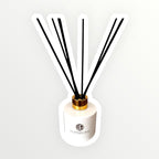 Diffuser with black sticks on a white background