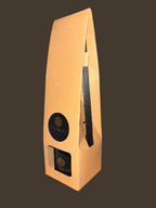 Reed Diffuser in Kraft packaging box with black fibre reeds on side with brown background
