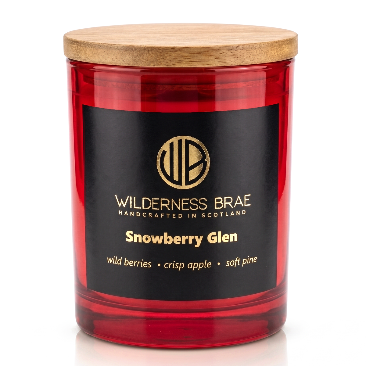Snowberry Glen soy candle handcrafted in Scotland by Wilderness Brae. Red candle with Lid on, close up shot.