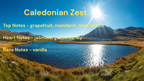 Scenic landscape with a lake and mountains, overlaid with text about 'Caledonian Zest' fragrance.