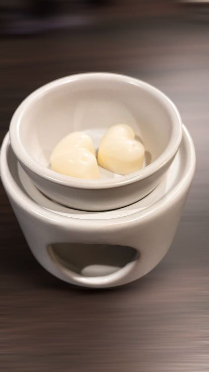 2 wax melts in white wax burner