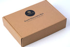 kraft box with black and gold round label